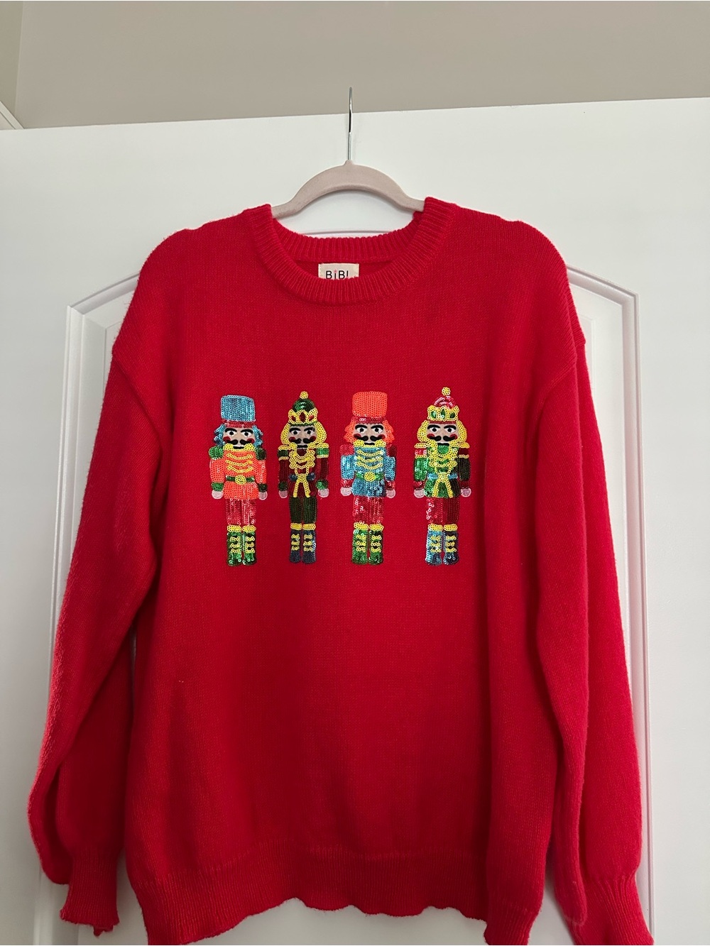 BiBi Red Crewneck Sweater with Sequin Nutcracker Motif